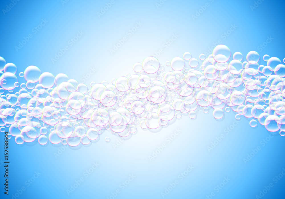 Soap bubbles abstract blue background with rainbow colored airy foam Soap bubbles abstract blue background with rainbow colored airy foam