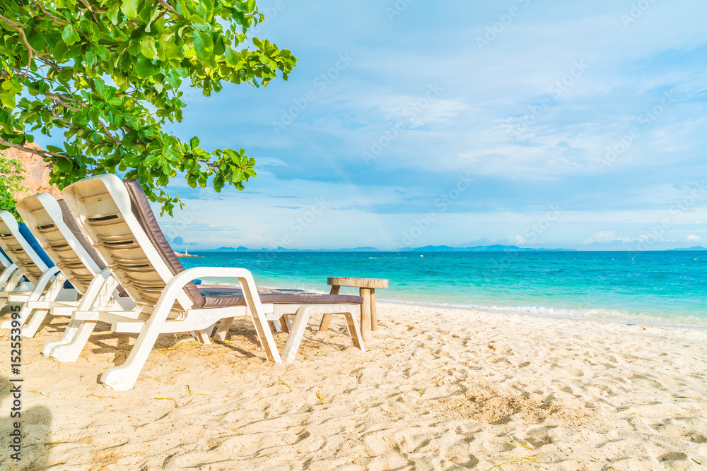 Beautiful luxury umbrella and chair on beach