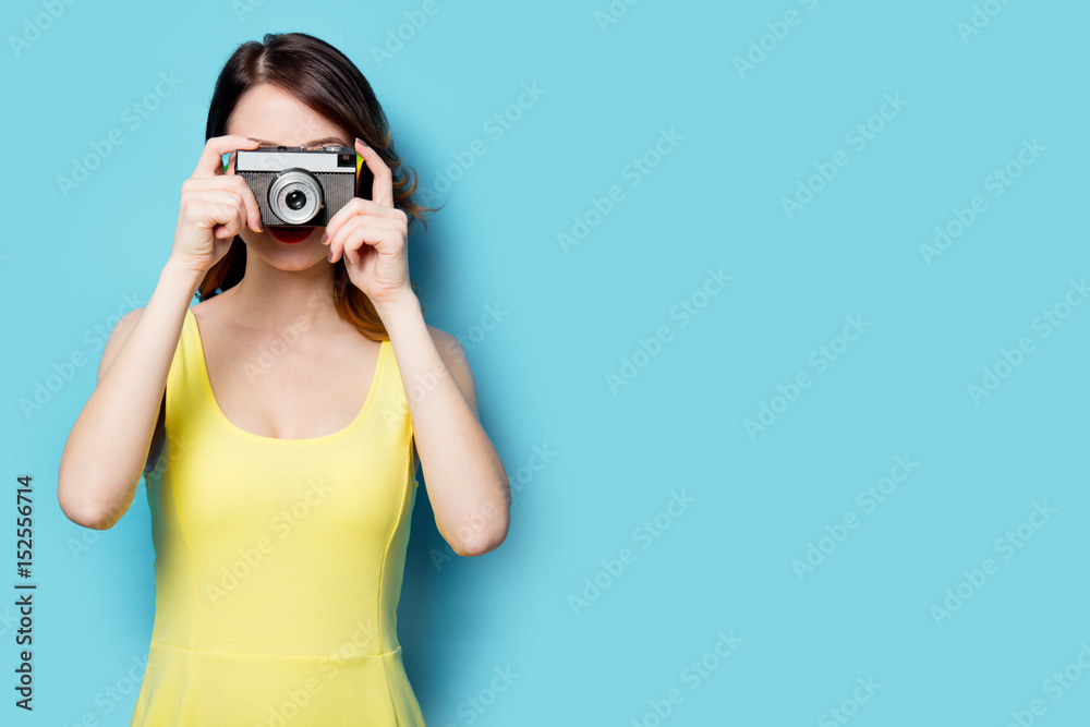 young woman with camera young woman with camera