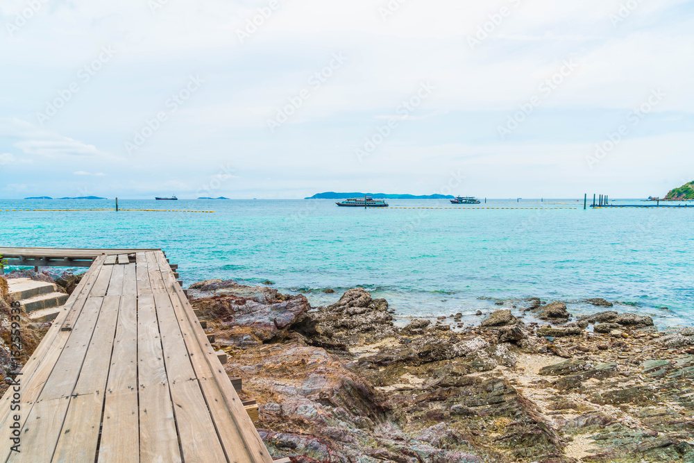Wooden Bridge with beautiful tropical beach at Koh Larn in Pattaya Wooden Bridge with beautiful tropical beach at Koh Larn in Pattaya