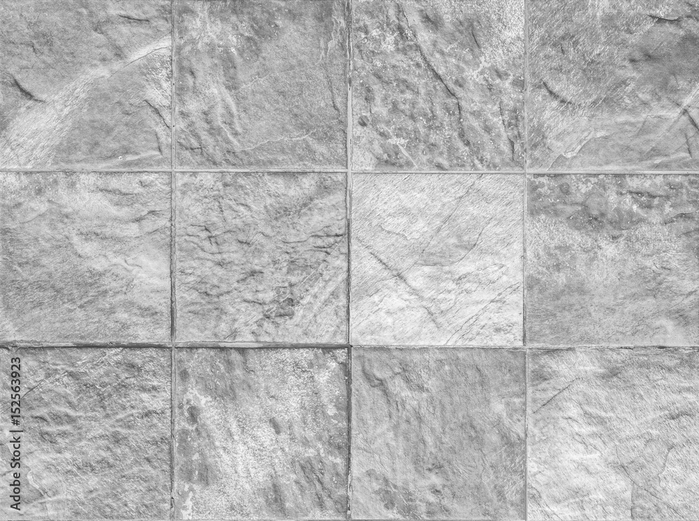 Obraz premium Closeup surface brick pattern at brick stone wall textured background in black and white tone