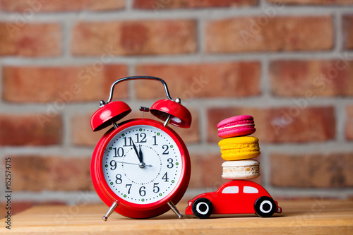 macaroons, alarm clock and toy