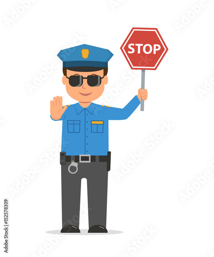 Traffic policeman holding a stop sign.