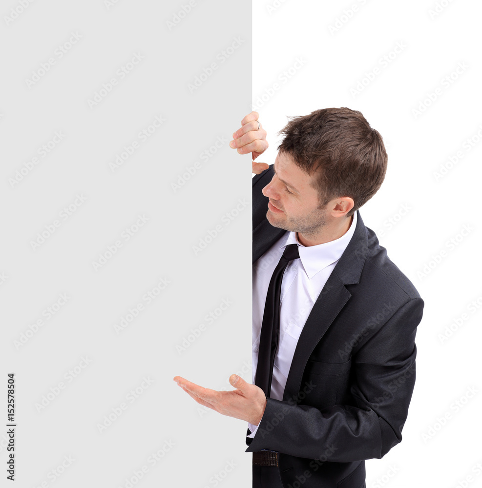 Portrait of businessman pointing at something. Portrait of businessman pointing at something.