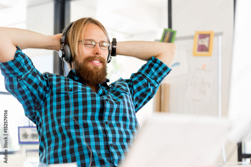 Fototapeta premium Young man working in office