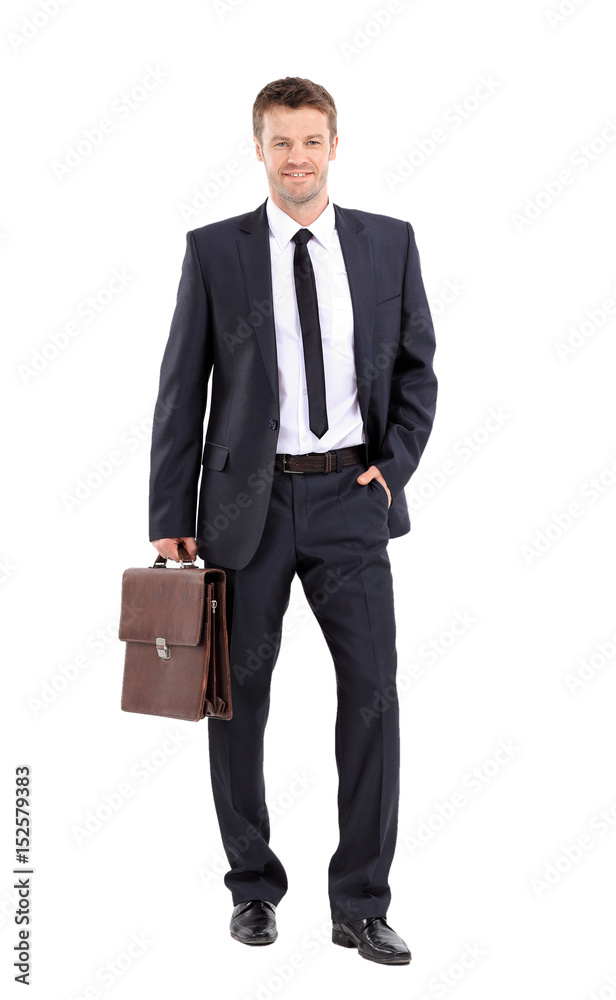 Portrait of an elegant handsome business man with suitcase on w Portrait of an elegant handsome business man with suitcase on w