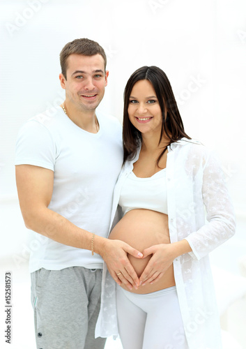 Delighted young parents expecting a little baby