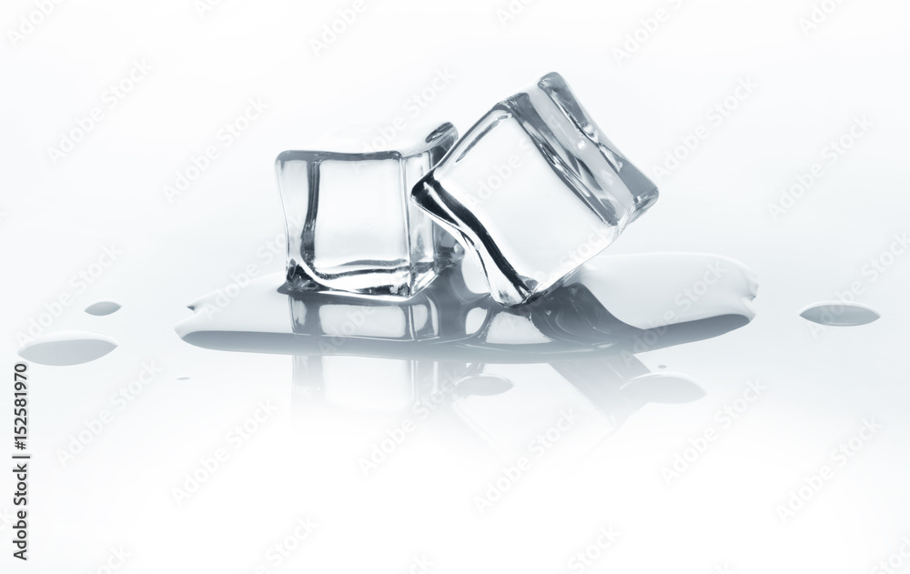 Melting ice cubes with reflection isolated on white. Melting ice cubes with reflection isolated on white.