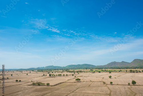 Fotografija Global warming, died and cracked soil in arid season,View of the desert field