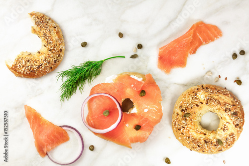 Tableau sur toile Making lox bagels, on white marble background with copyspace