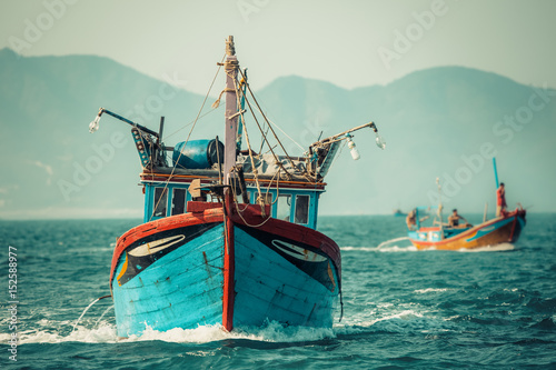 Fishing boat sailing on water