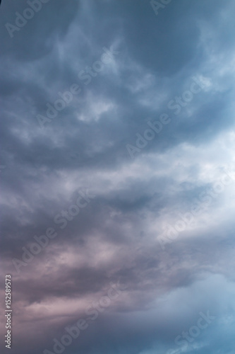 Beautiful clouds at sunset after rain as background .