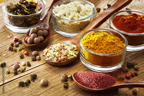 Spicy food & drink Italian colorful cuisine healthy lifestyle concept: Mediterranean Turkish spices herbs vegetables. Closeup Wooden background Top view Peppers Curry rosemary Italian herbs 