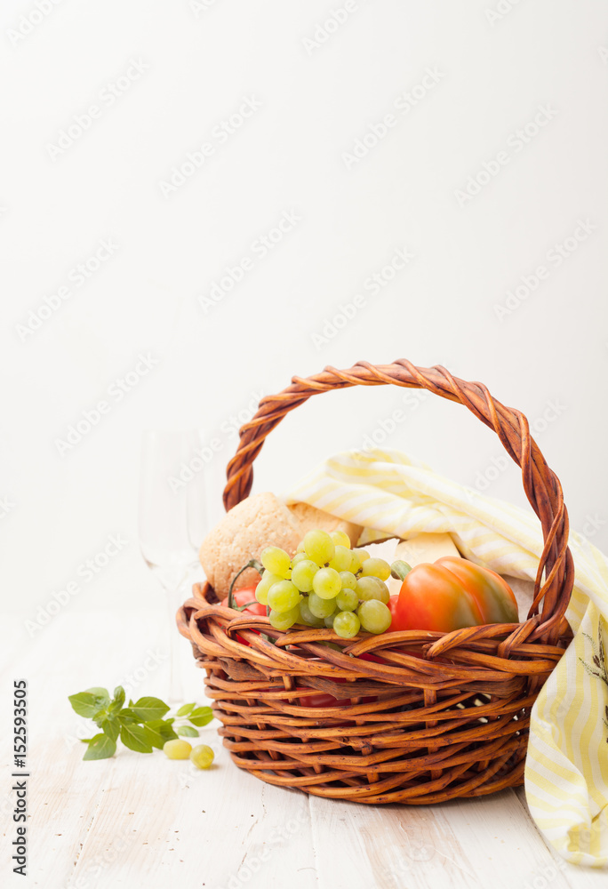 Basket for a picnic on a white background