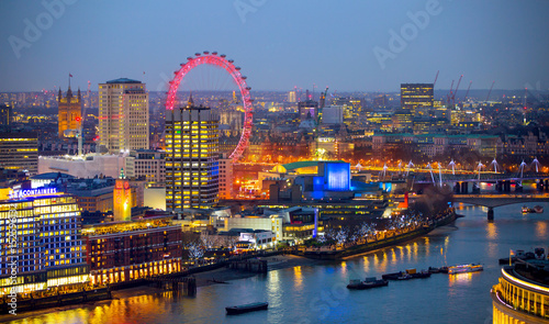 London at night, view at River Thames embankment and London bridge with night lights reflection