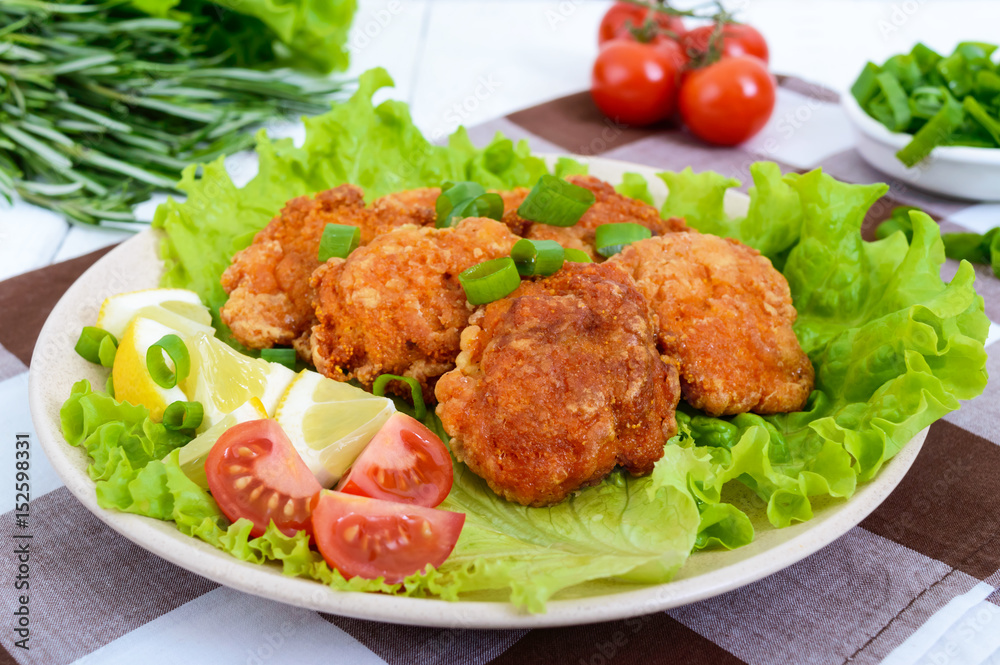 Fried caviar of river fish with lettuce leaves, cherry tomatoes on a light background. A dietary dish. Healthy eating. Fried caviar of river fish with lettuce leaves, cherry tomatoes on a light background. A dietary dish. Healthy eating.