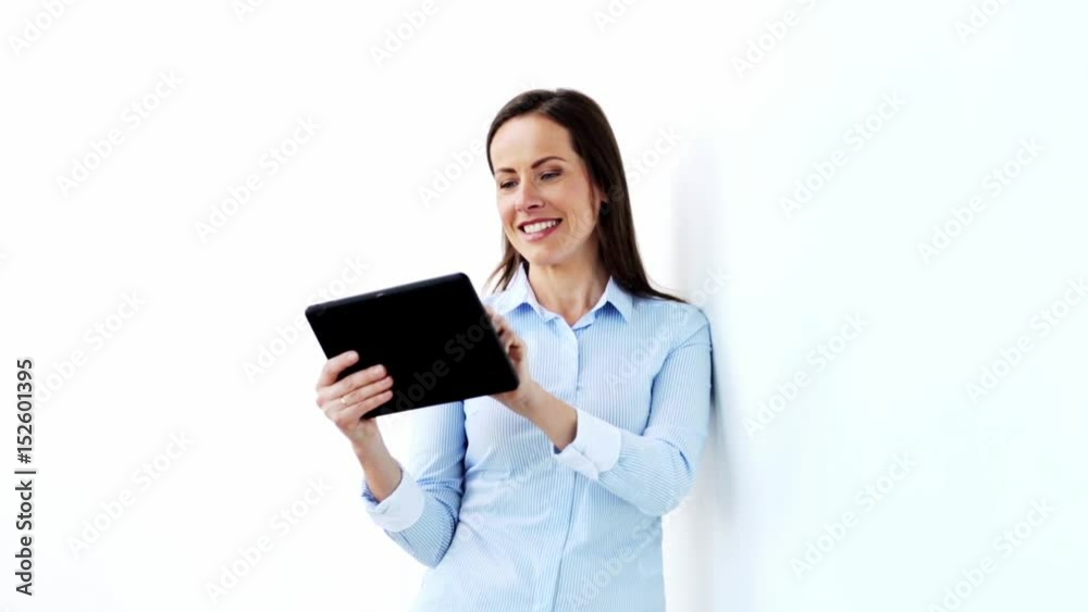smiling businesswoman with tablet pc computer smiling businesswoman with tablet pc computer