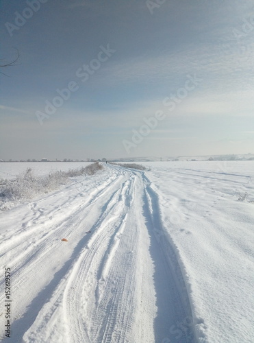 Road in snowy field