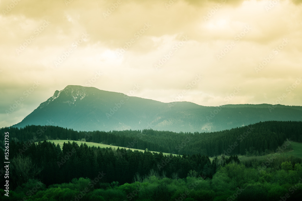 A beautiful mountain scenery of Tatra mountains. Warm summer haze, artistic, colorful, contrast look. A beautiful mountain scenery of Tatra mountains. Warm summer haze, artistic, colorful, contrast look.