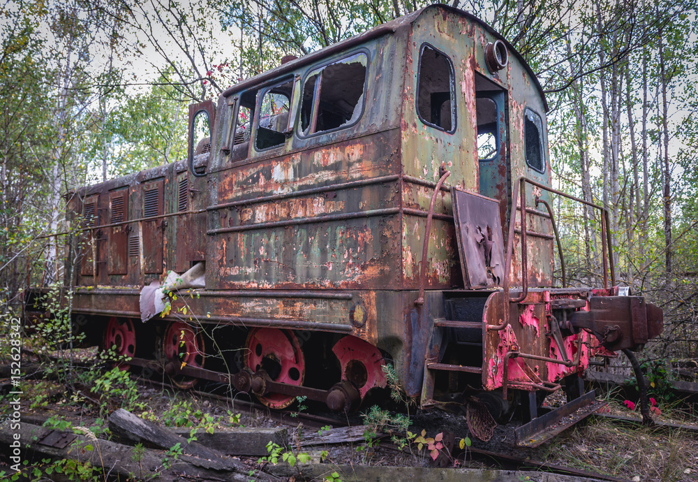 Old rusty locomotive near Prypiat ghost town of Chernobyl Exclusion Zone, Ukraine