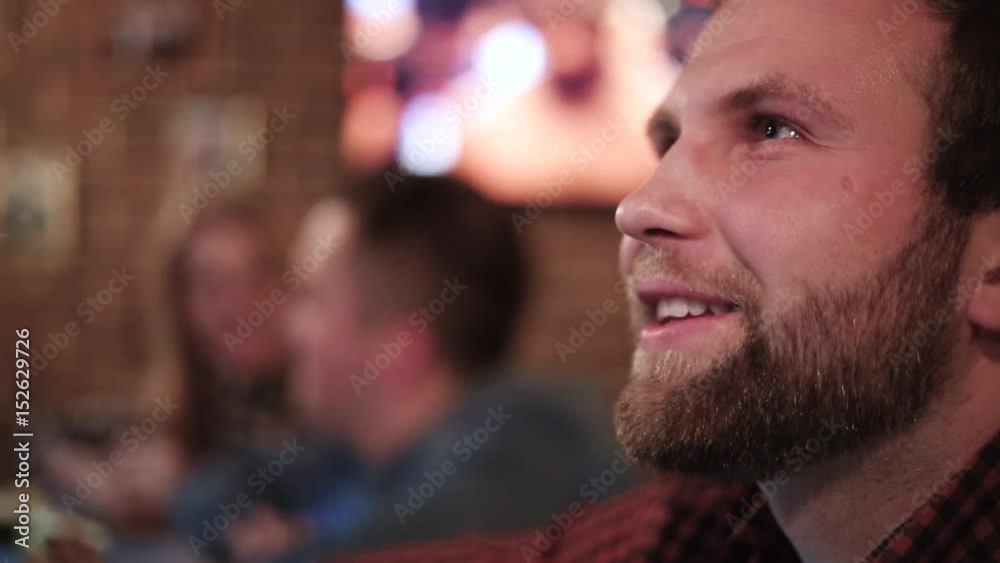 smiling man relaxing in the beer bar smiling man relaxing in the beer bar
