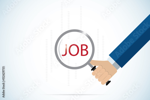 hand holding magnifying glass over jobs text, job and business concept