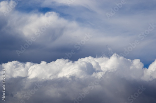 Cumulonimbus cloud on blue sky background