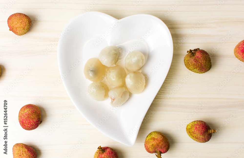Lychee tropical fruit on wooden table