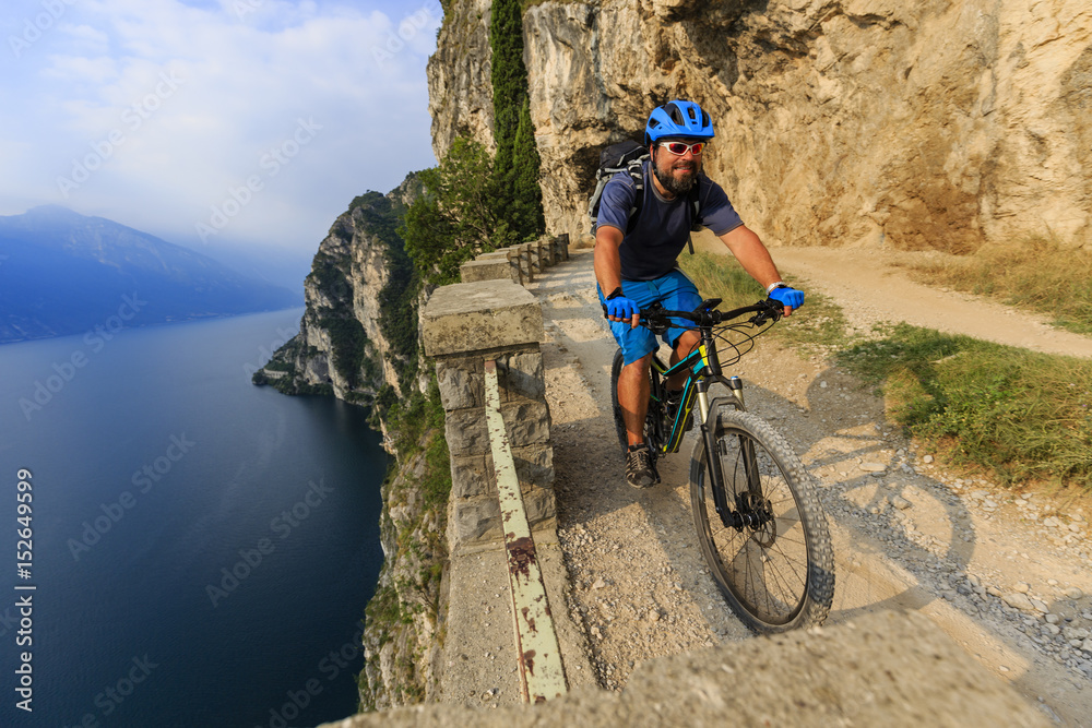Mountain biking on Lake Garda, Sentiero della Ponale, Riva del Garda, Italy