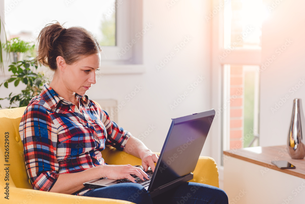 Woman using laptop Woman using laptop