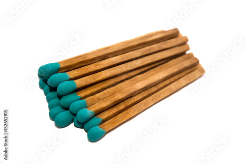 Close-up of a blue match on white backgrounds