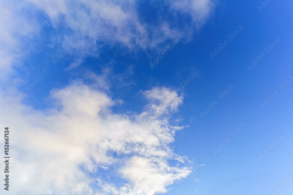 Beautiful white clouds and blue sky background