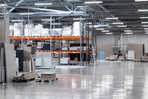 Piece of typical production industrial warehouse equipment with stored products. Copy space.