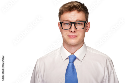 Business man over white background, shirt and tie smiling.