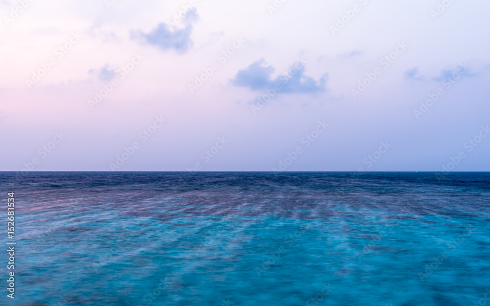 Ocean at sunset. Colorful sunset over the Indian Ocean. Long exposure.
