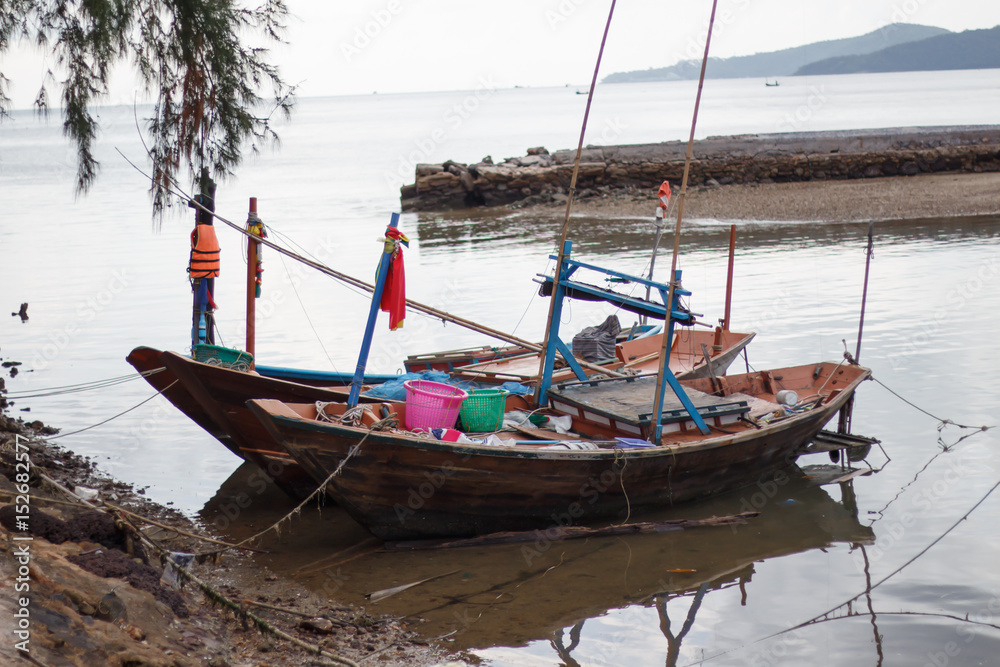 Small fishing boats near the island