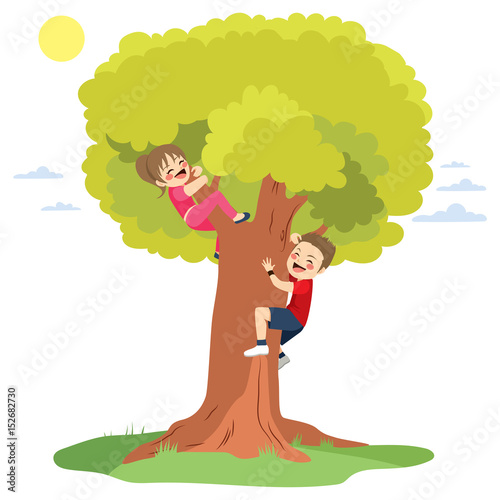 Two cute happy little children having fun climbing big tree