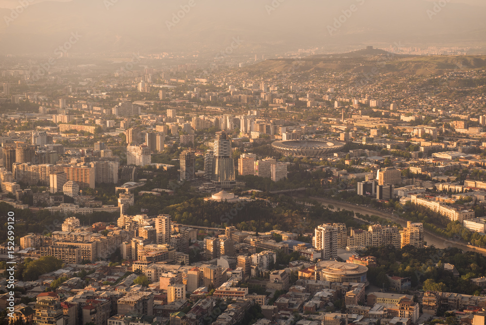 Cityscape of modern Tbilisi on a sunset
