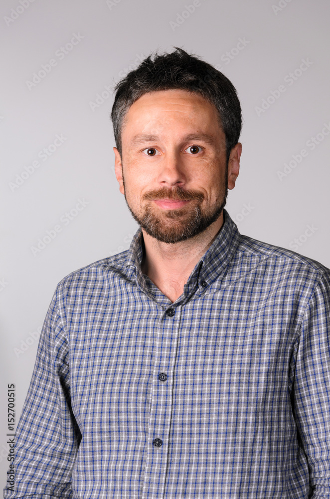 Fototapeta premium Portrait of handsome bearded businessman