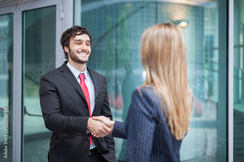 Business people shaking hands