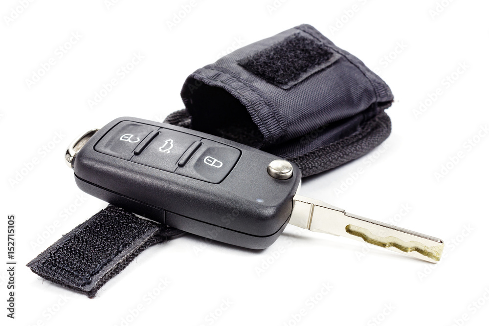 Ignition key with storage pouch on a white background Ignition key with storage pouch on a white background
