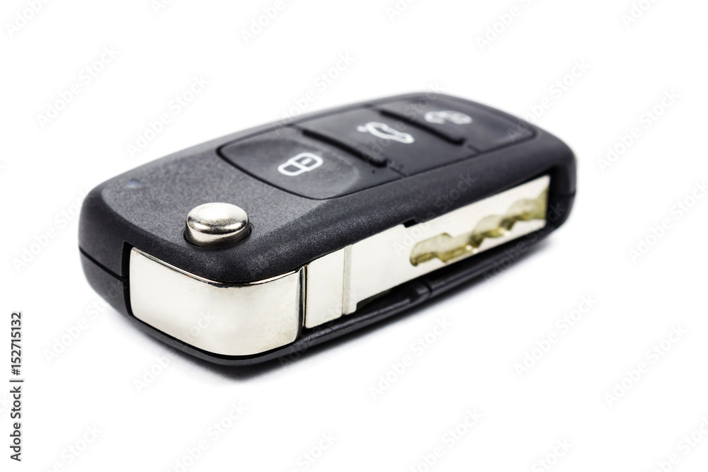 Closed ignition key on a white background Closed ignition key on a white background