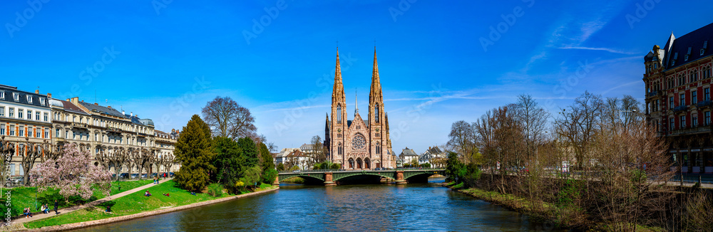 Panoramic view of beautiful church in Strasbourg from the river side Panoramic view of beautiful church in Strasbourg from the river side