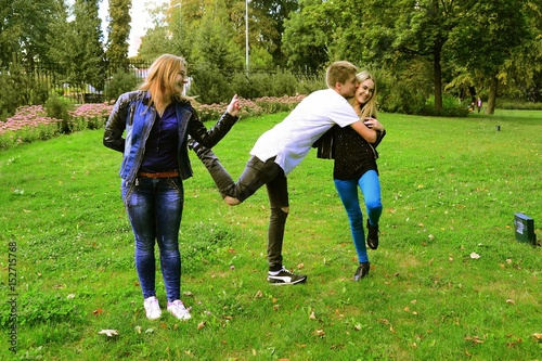 Love triangle in Vilnius town Bernardinu garden on autumn