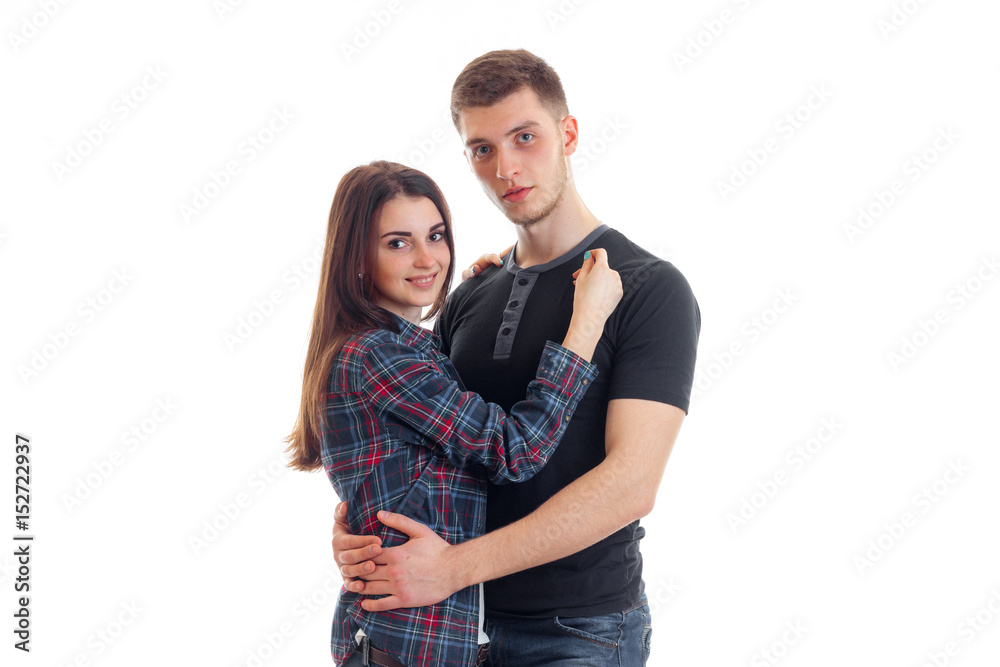 cute smiling girl in shirt standing next to the handsome guy cute smiling girl in shirt standing next to the handsome guy