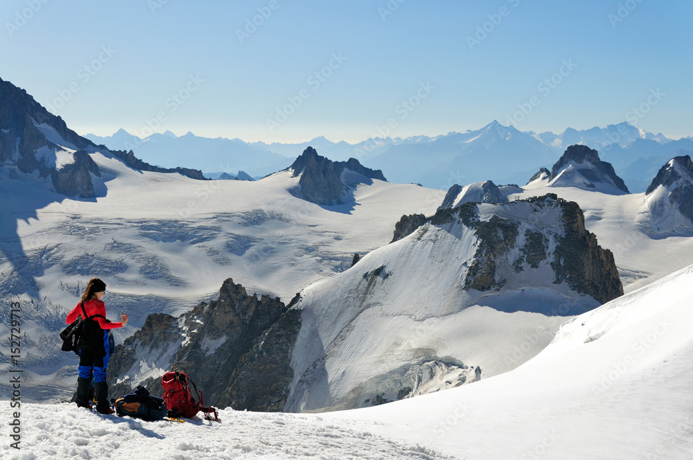 Climber in a high winter mountain