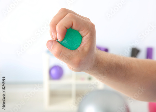Male hand with stress ball ...