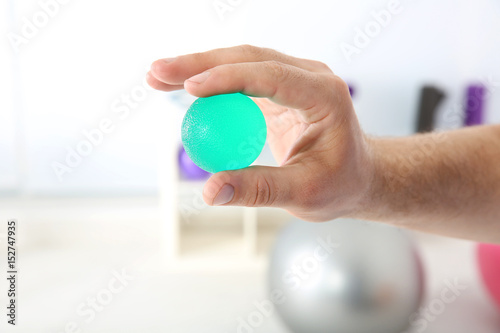 Male hand with stress ball ...
