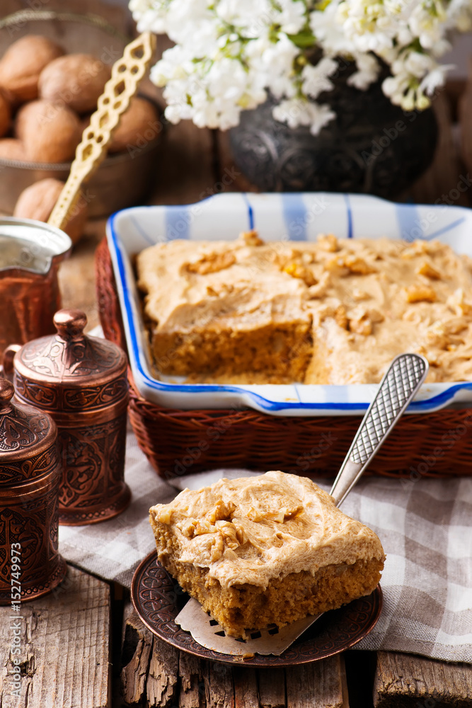 Fototapeta premium coffee and walnut cake.style rustic