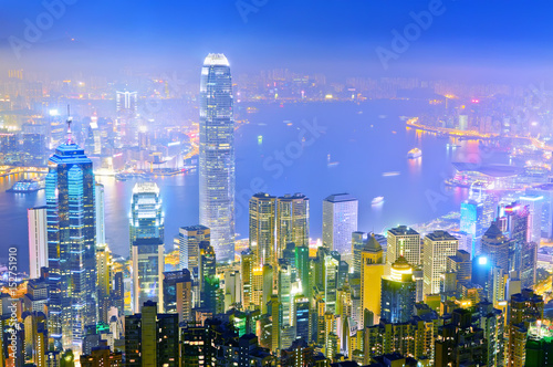Victoria Harbor and Hong Kong skyline at night. © Javen